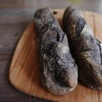 Black baguette made with black cocoa powder